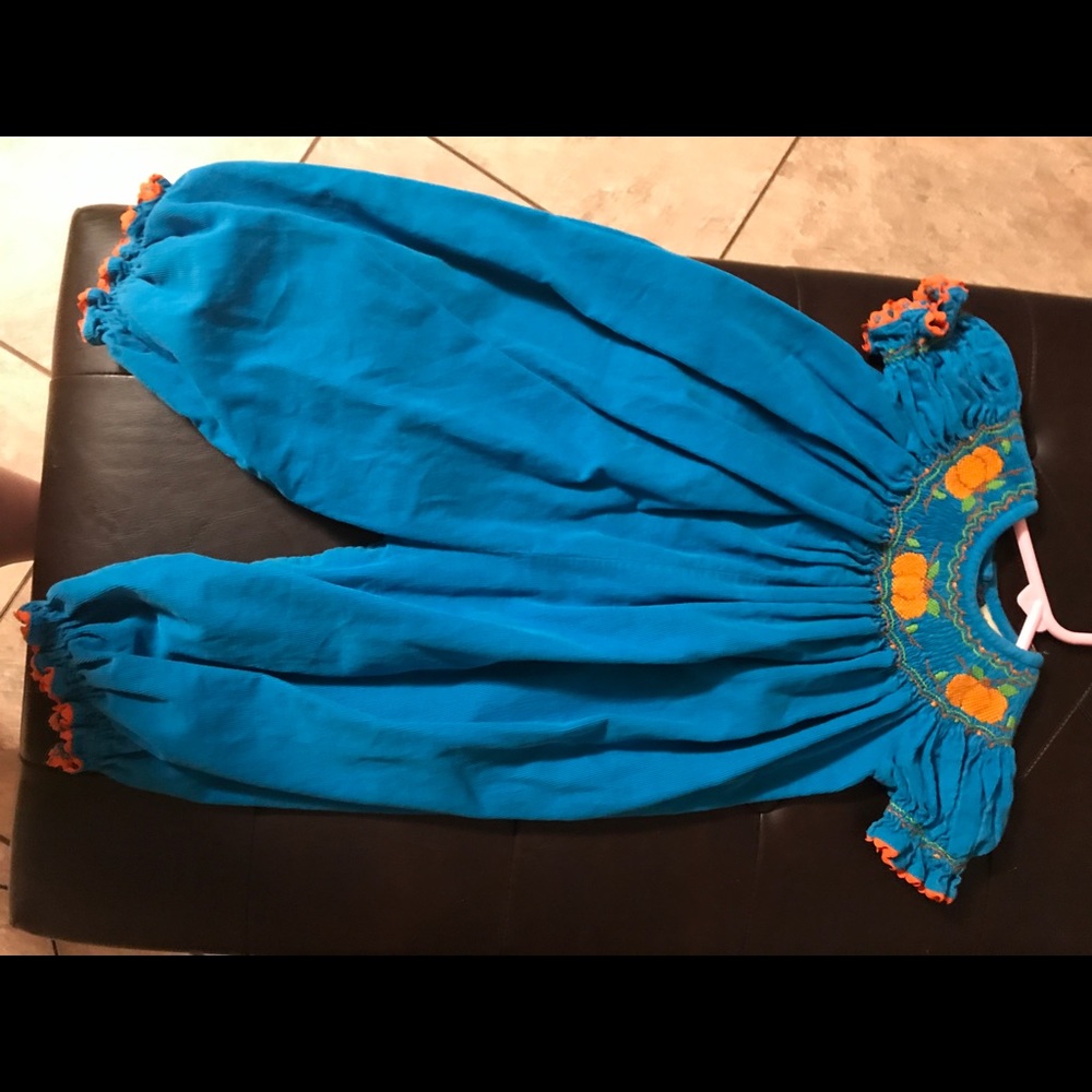 Smocked pumpkin romper