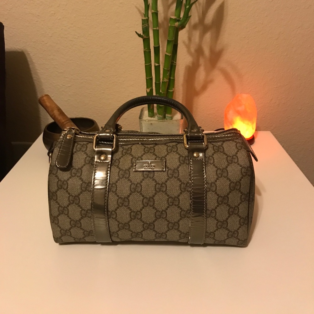 Authentic gently used Gucci Boston gold metallic