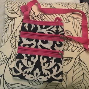 Black and pink cross body bag