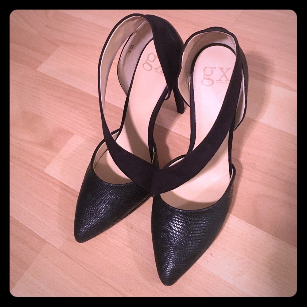 Black single strap pointed toe pumps