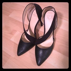 Black single strap pointed toe pumps