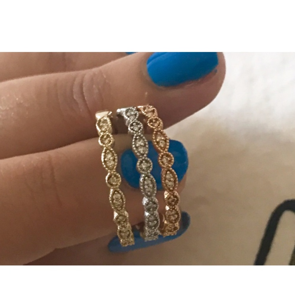 white, rose, and yellow gold diamond ring