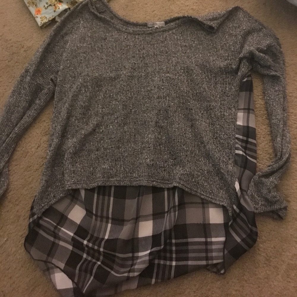 Long sleeved plaid high low shirt