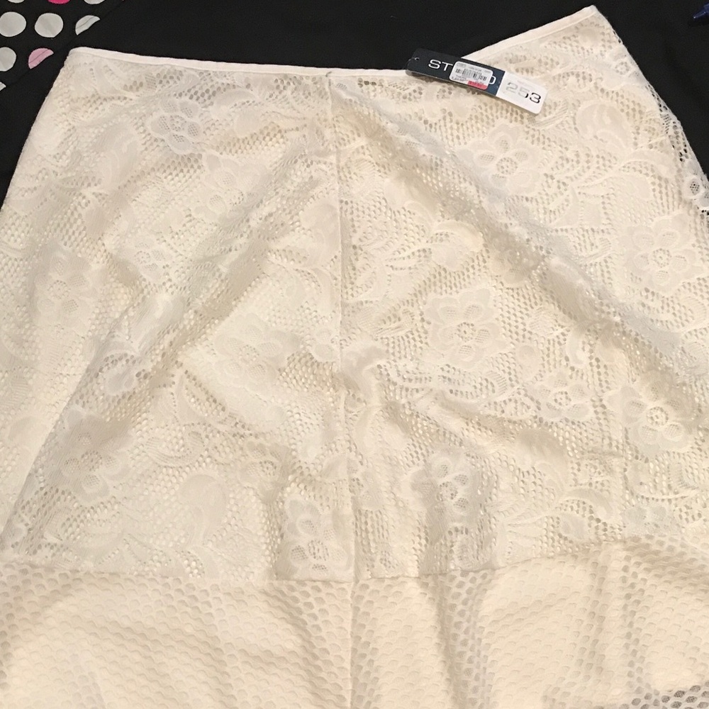 NWT. Cream colored skirt.