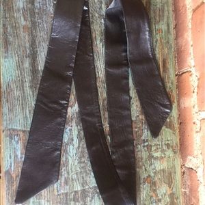 Black leather tie belt