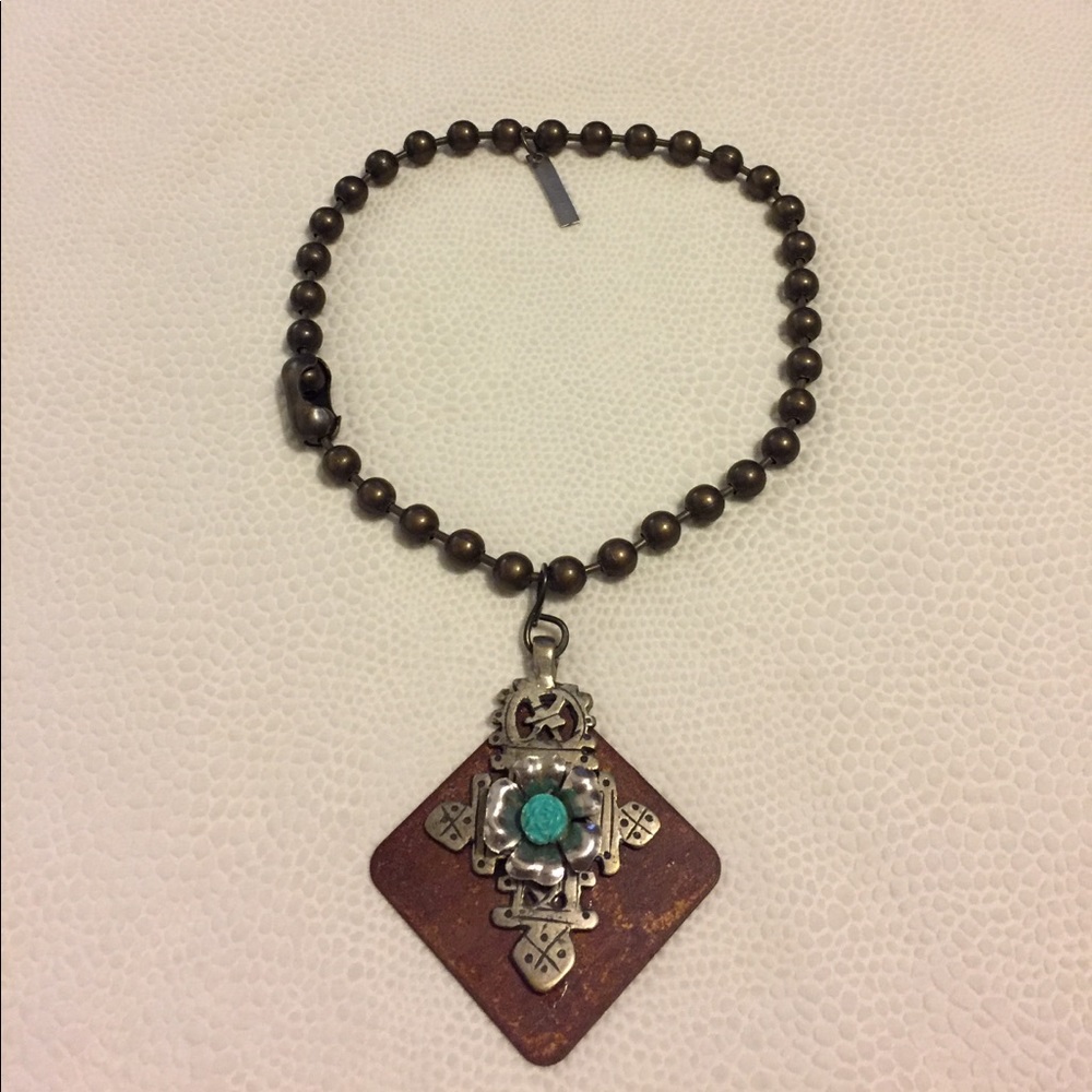 Tres Melindas necklace