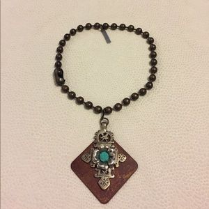 Tres Melindas necklace