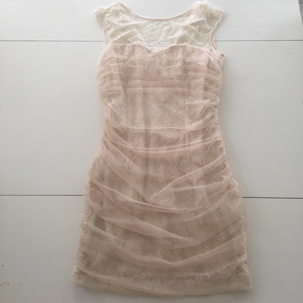Nude mini dress never worn before