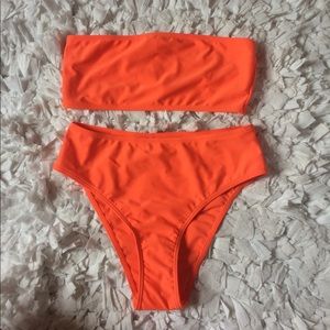 Orange two piece with high waisted bottoms!