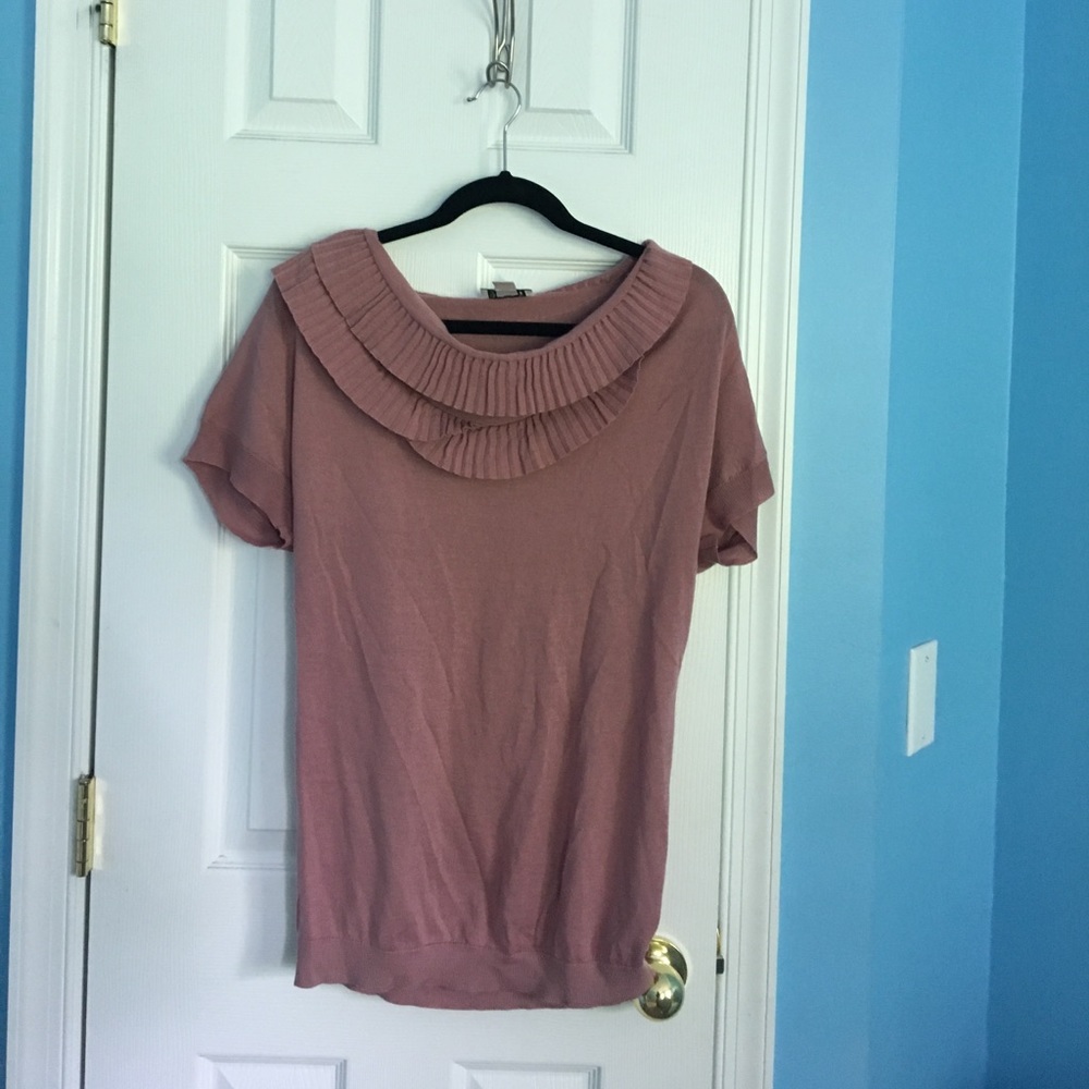 Women's top with ruffled neckline