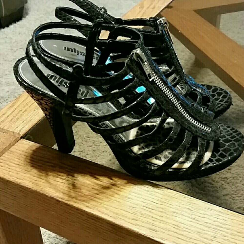 Black caged platform zipper heels