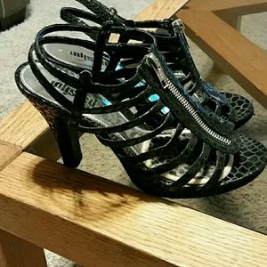 Black caged platform zipper heels