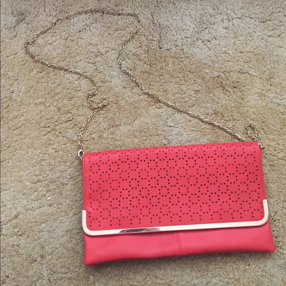 Burnt orange/red with cut out detail.
