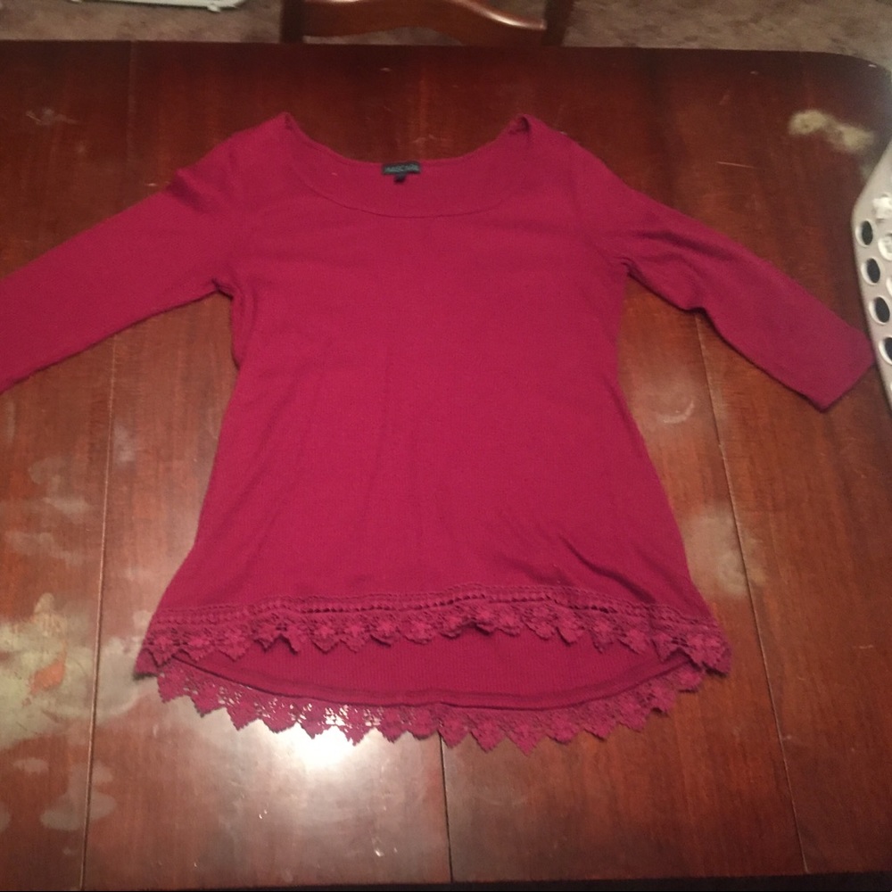 Cute maroon top with lace details at the bottom