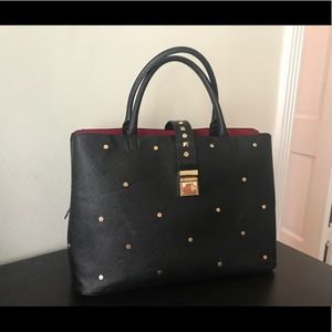 Black bag with golden studs