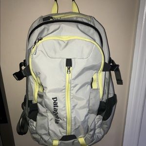 Patagonia Grey with yellow accent backpack.