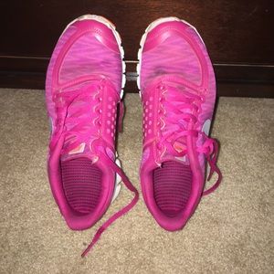 Pink chevron Nike tennis shoes