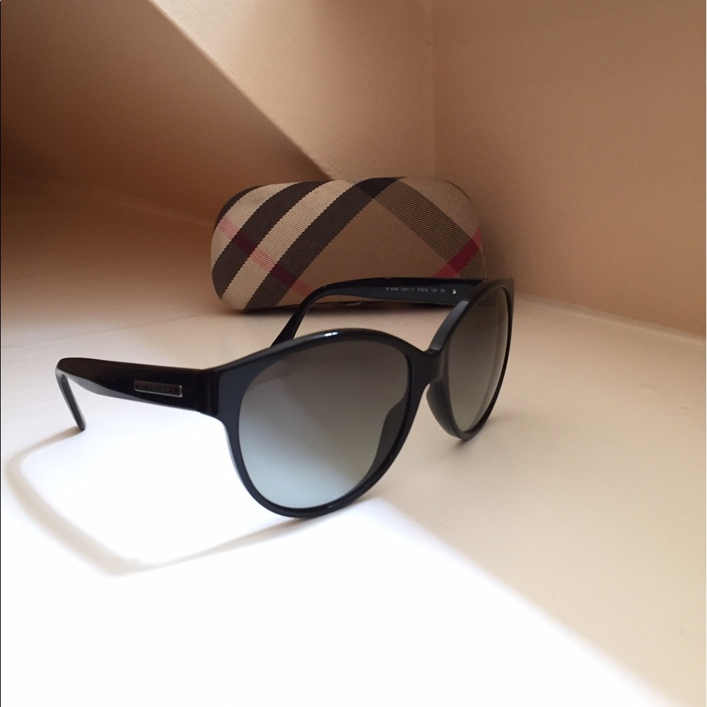 Black Burberry sunglasses and case, made in Italy