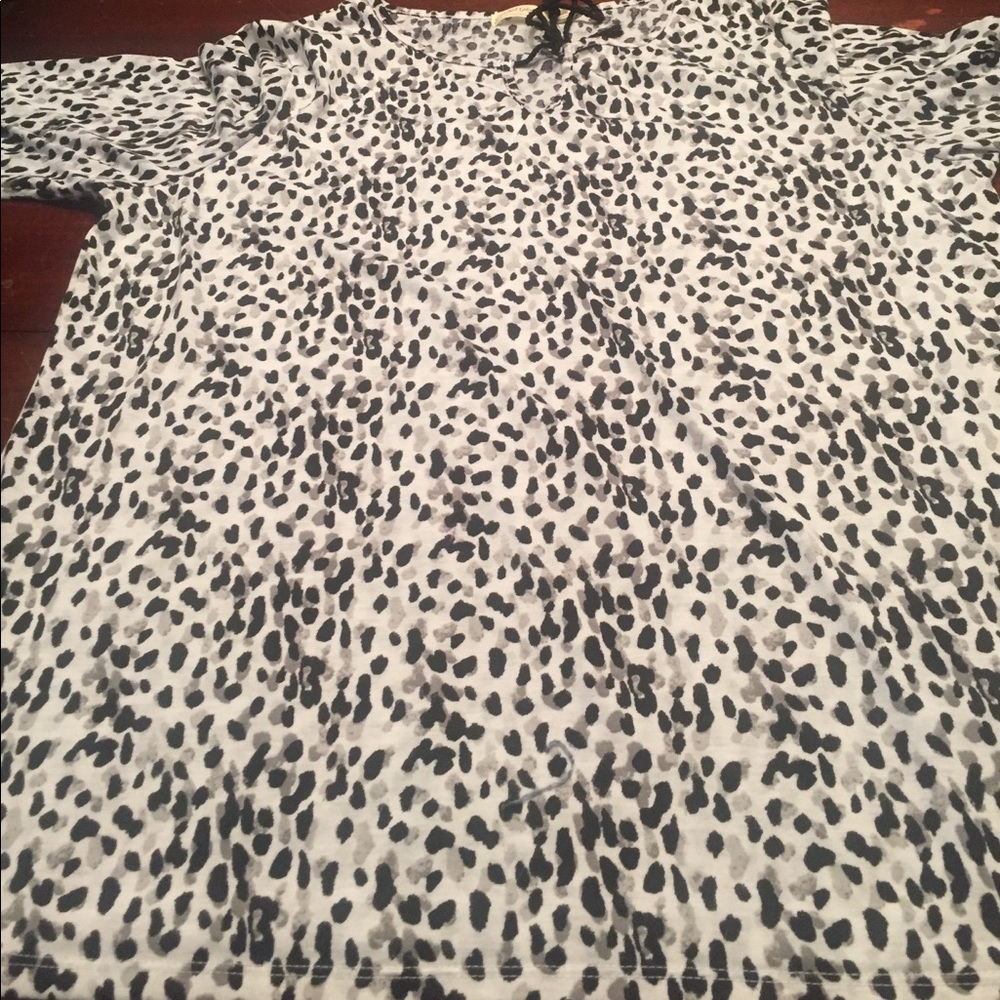 White with black and grey Polkadot top.