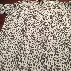 White with black and grey Polkadot top.