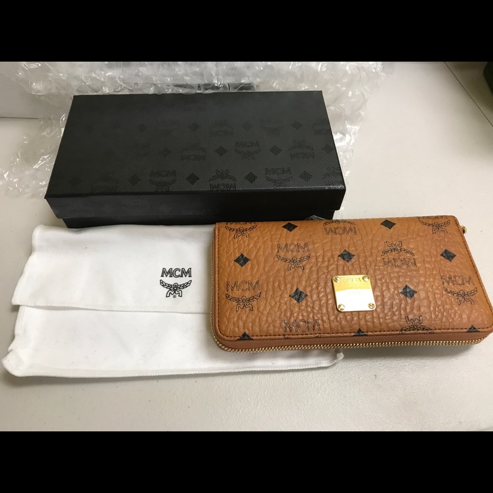NWT NIB zip around wallet by MCM Italy