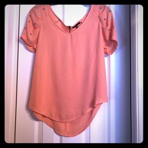 Pink top with jeweled sleeves