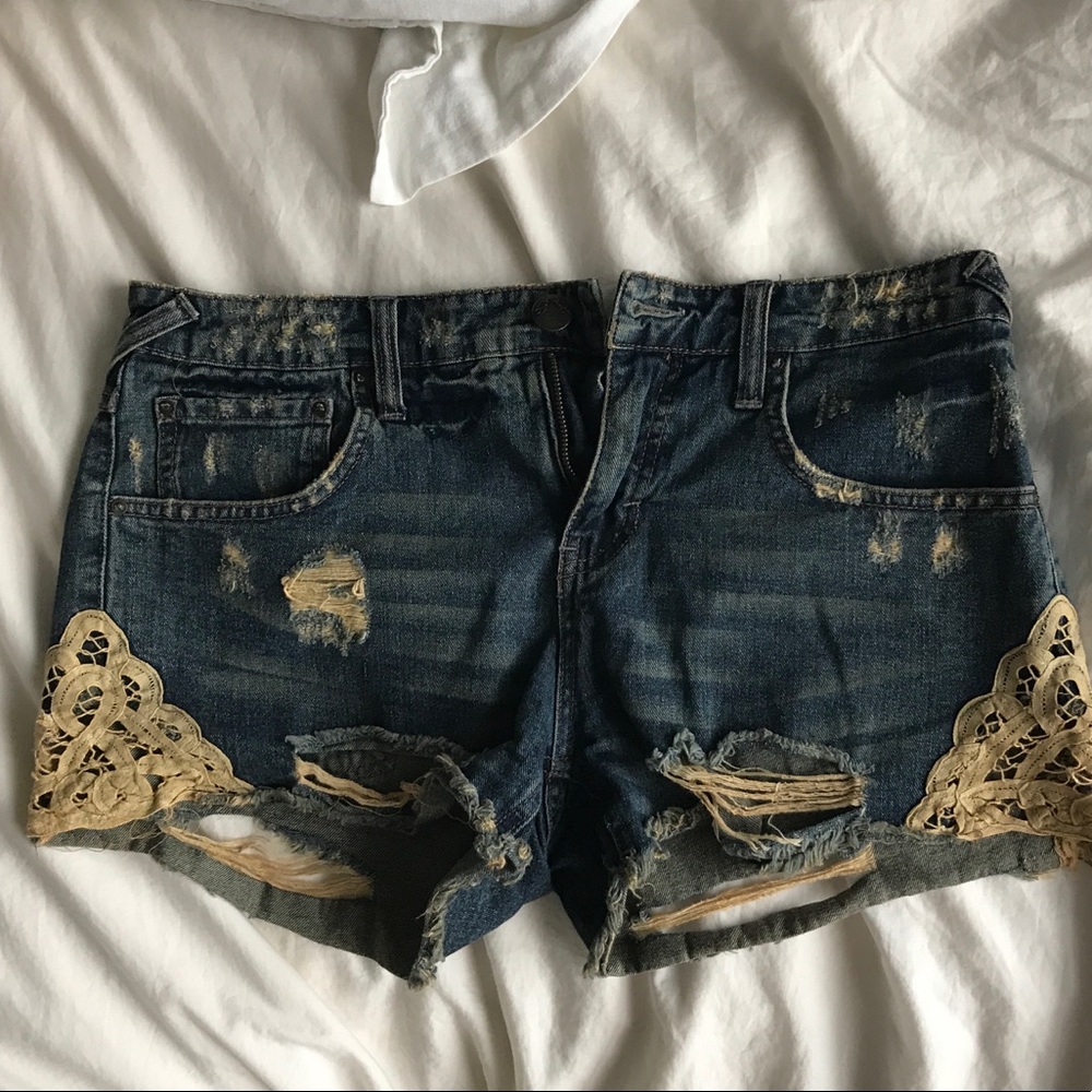 Free People distressed denim shorts