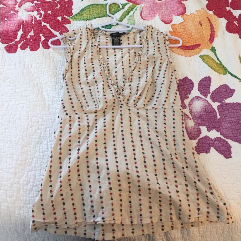 Flowery thin blouse with a cute bow back!