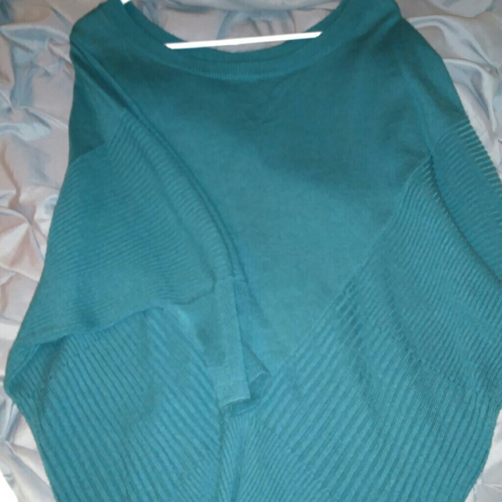 Poncho like top with elbow length sleeves