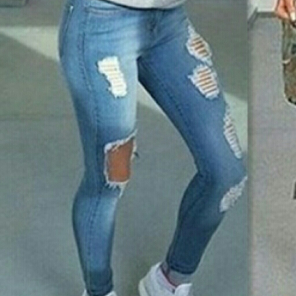 Womans distressed skinny jeans