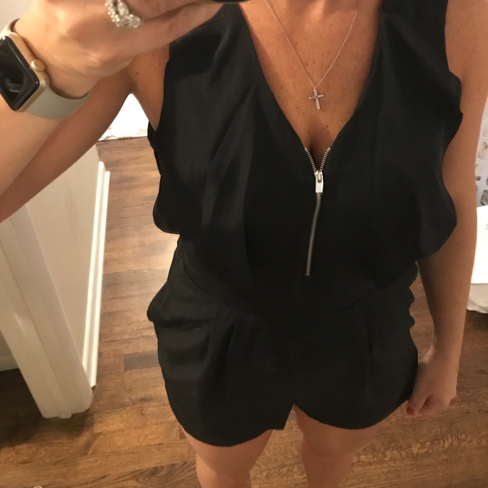 Black Express romper with zipper detail
