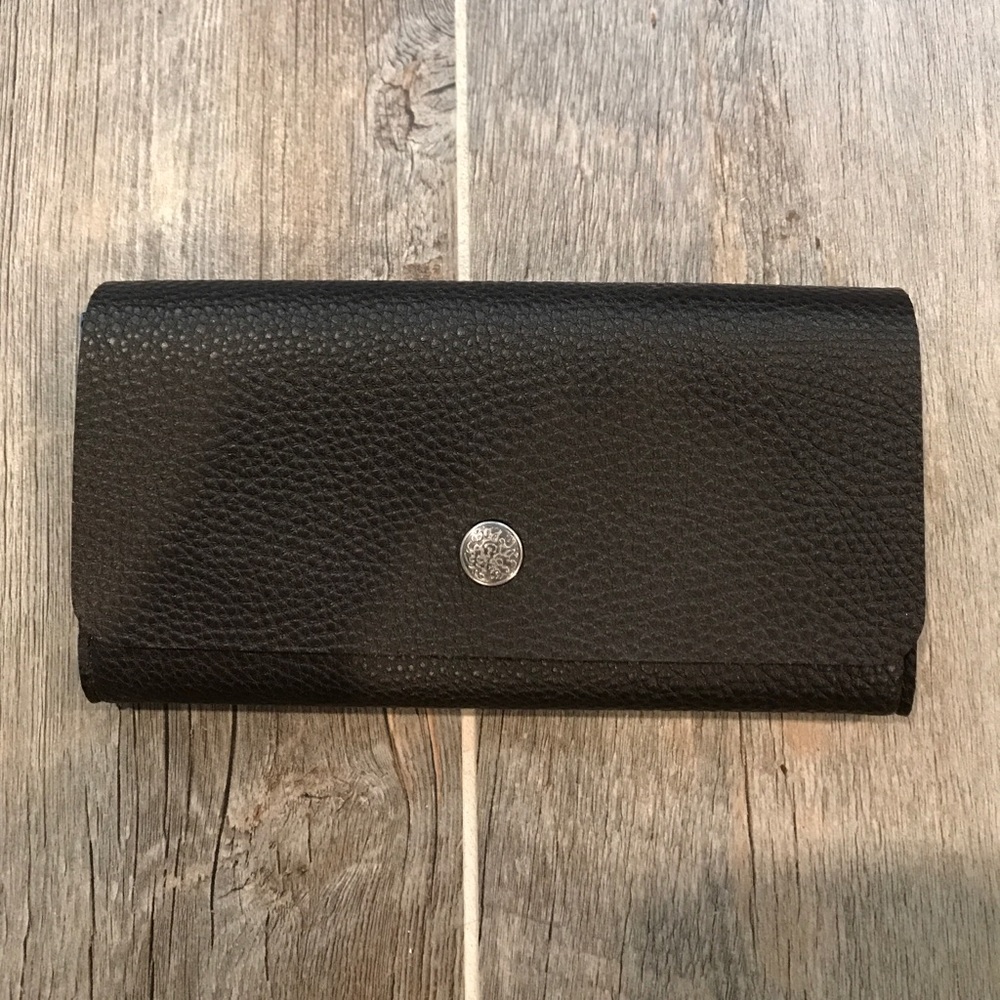 Guang Tong black leather wallet with felt interior