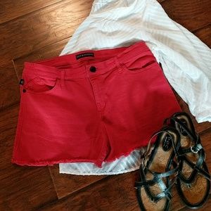 Rock & Republic bright red cut off shorts