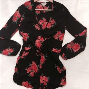 NWOT Flynn Skye long sleeve floral romper.
