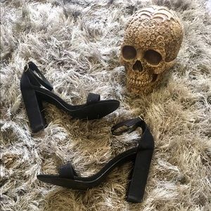 Black two-strap heels