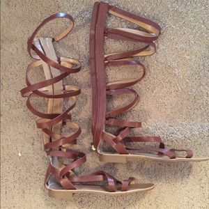 Brown tall gladiator sandals