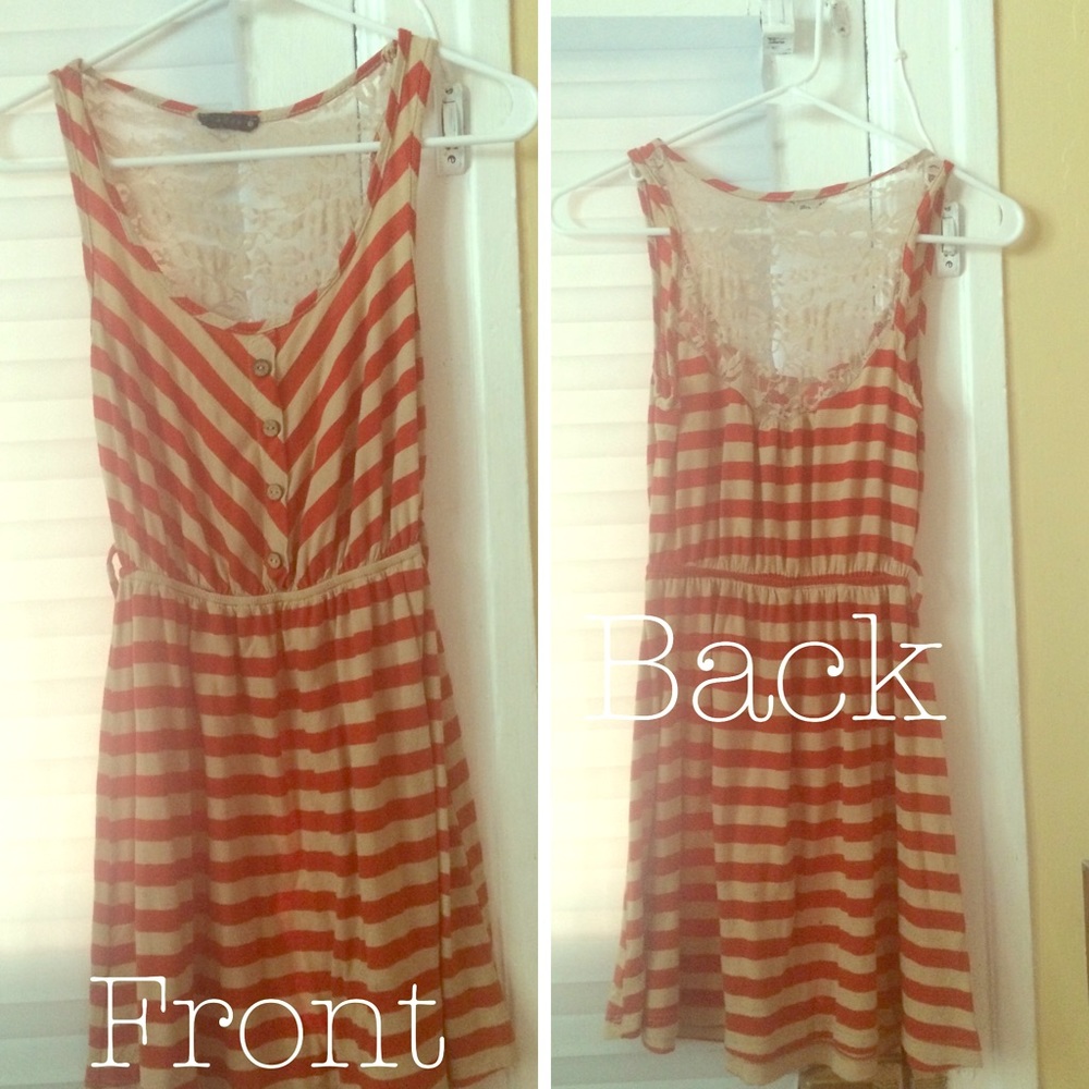 Cute little burnt orange and cream dress.