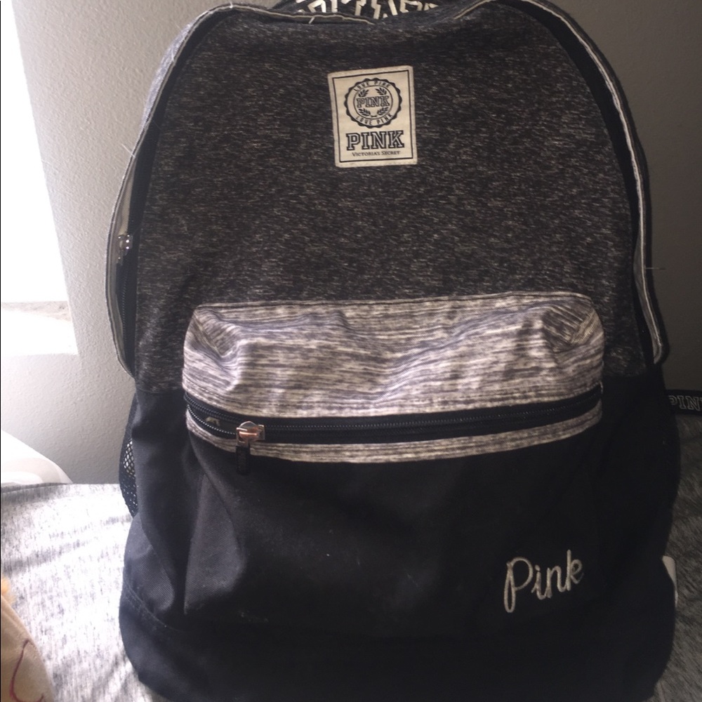 slightly used PINK backpack(: