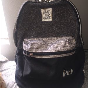 slightly used PINK backpack(: