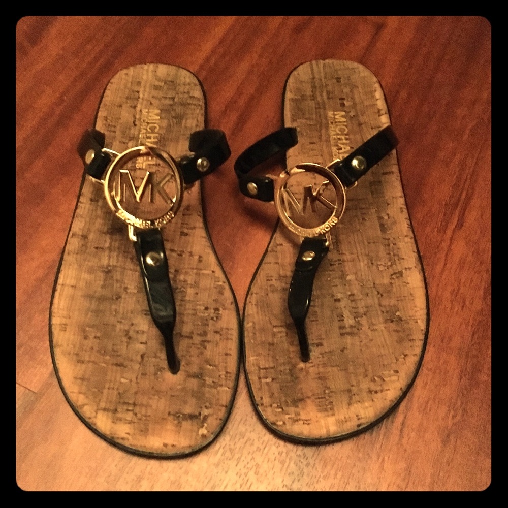 Michael Kors black flip flops