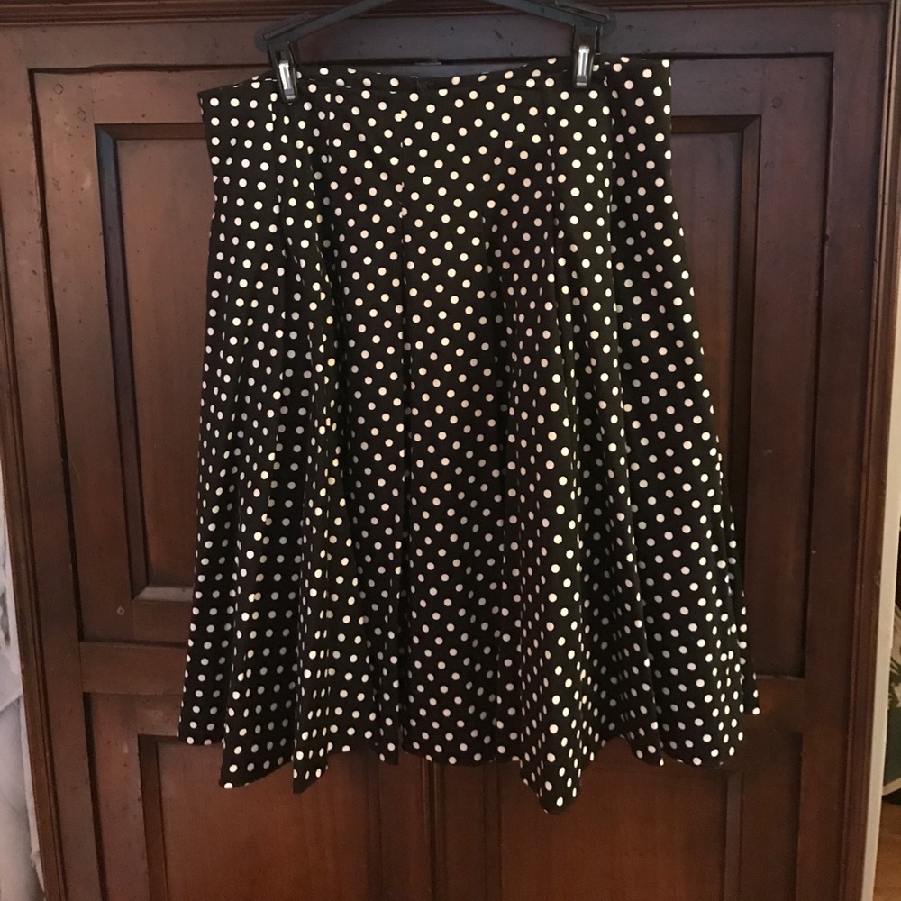 Black and white polka dot pleated skirt.