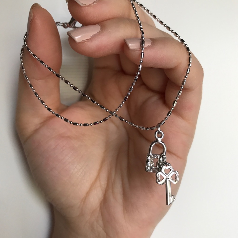 Silver key and lock charm bracelet