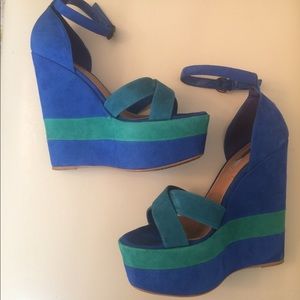 Stylish turquoise wedge heels with a green strip
