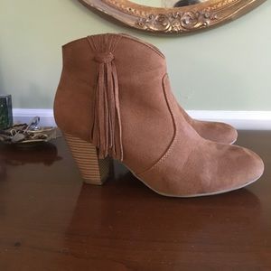 Report Myka tassel booties