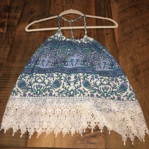 Floral patterns tank with cutout detailed bottom