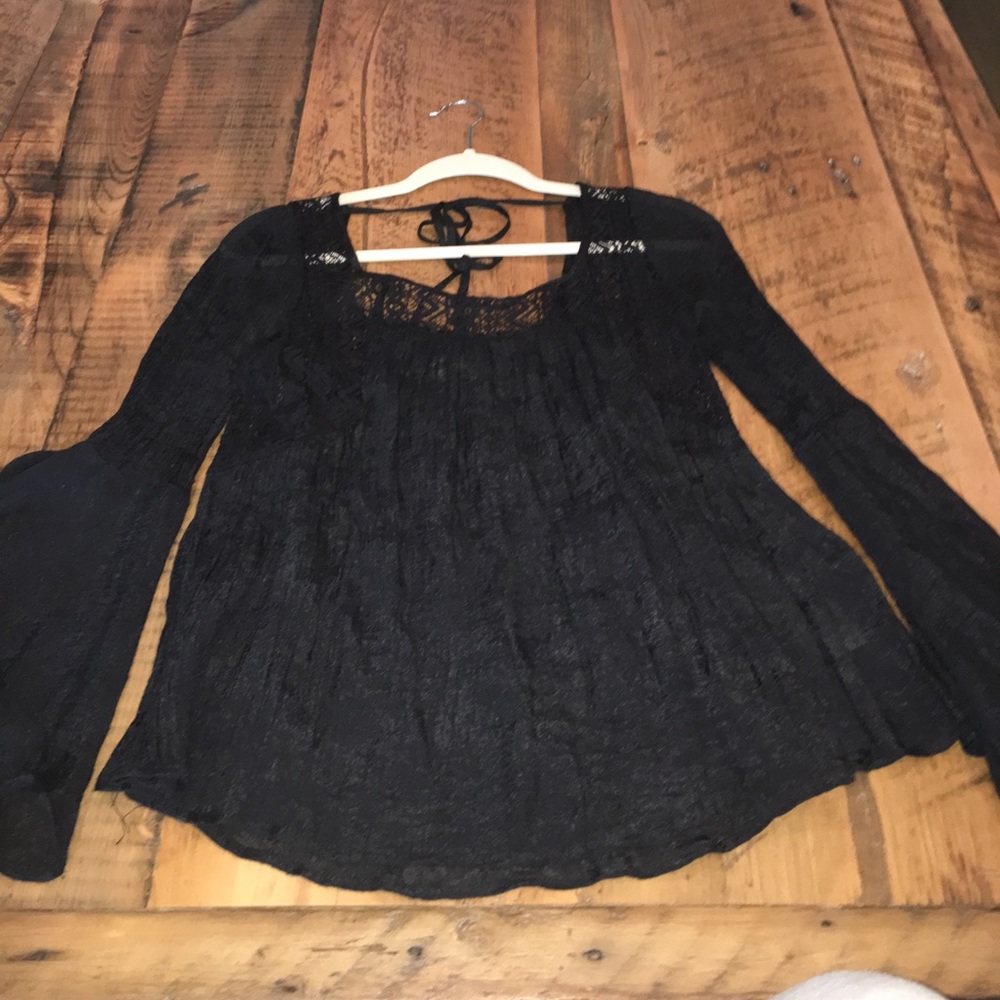 Bell sleeve long sleeve with cutouts on top