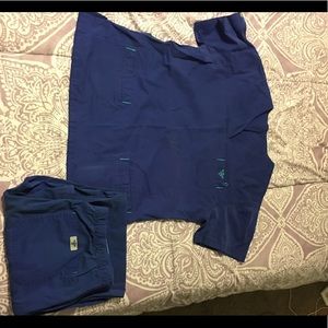 Woman's royal blue size small scrub set.