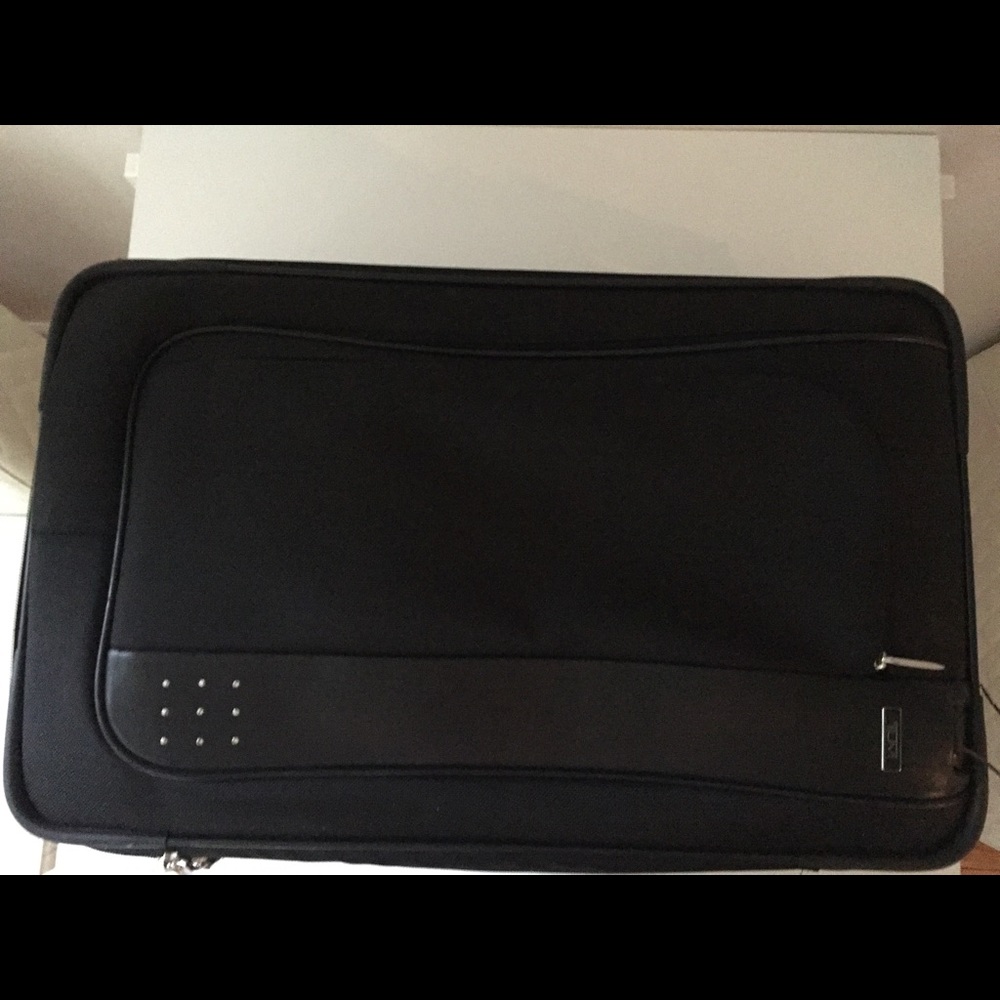 Tumi LXT discovery wheeled expandable 22"