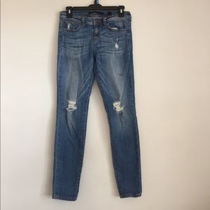Distressed boyfriend jeans