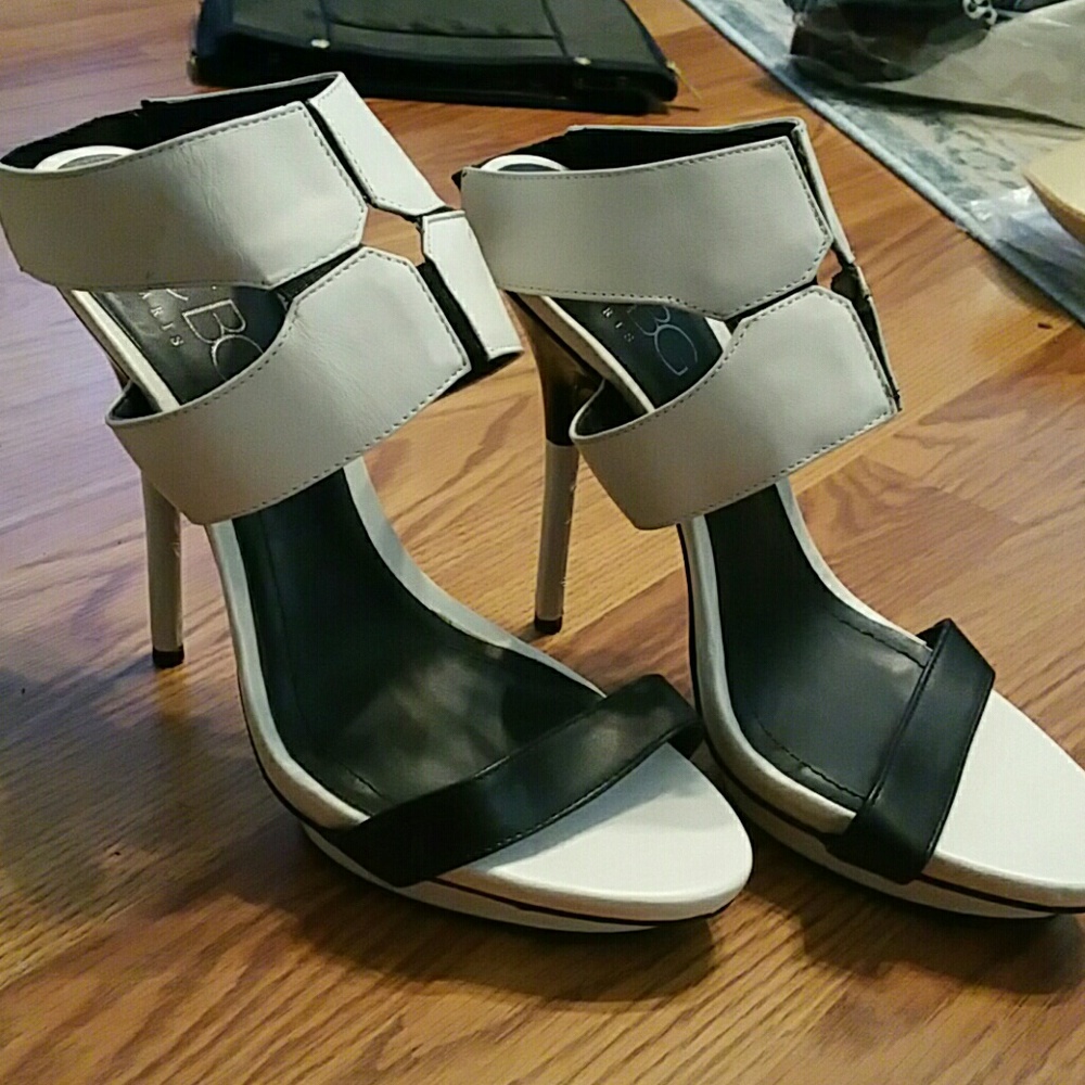 Black and white ankle strap stilettos